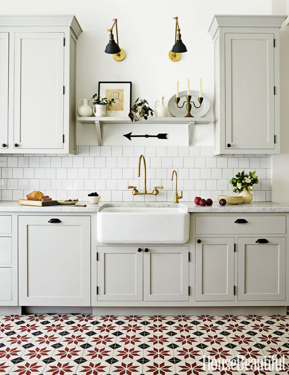 mosaic tiles flooring makes a statement in this kitchen