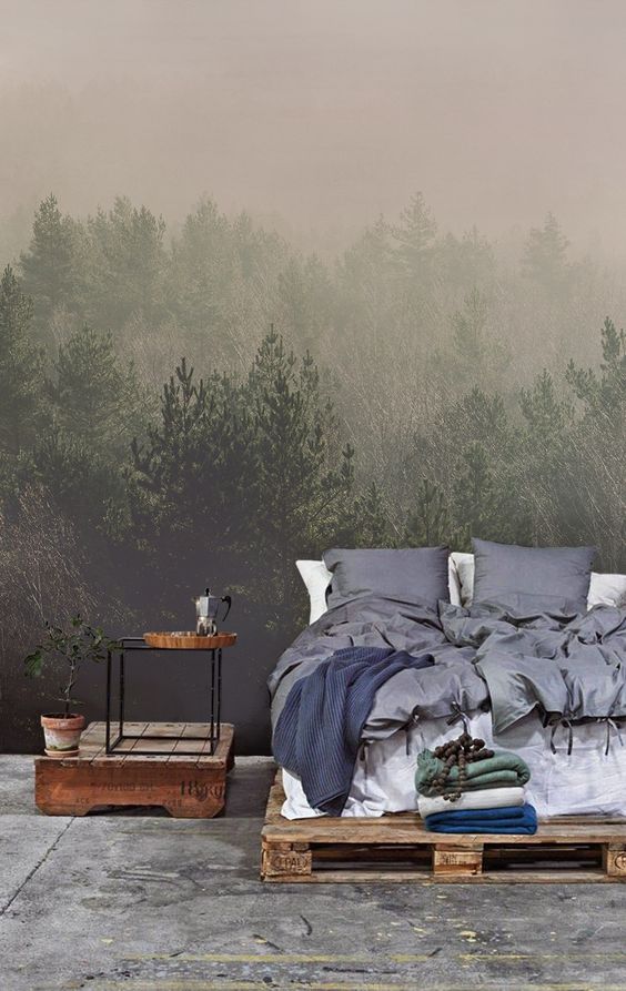 misty woodland photo mural adds a relaxing touch to the bedroom