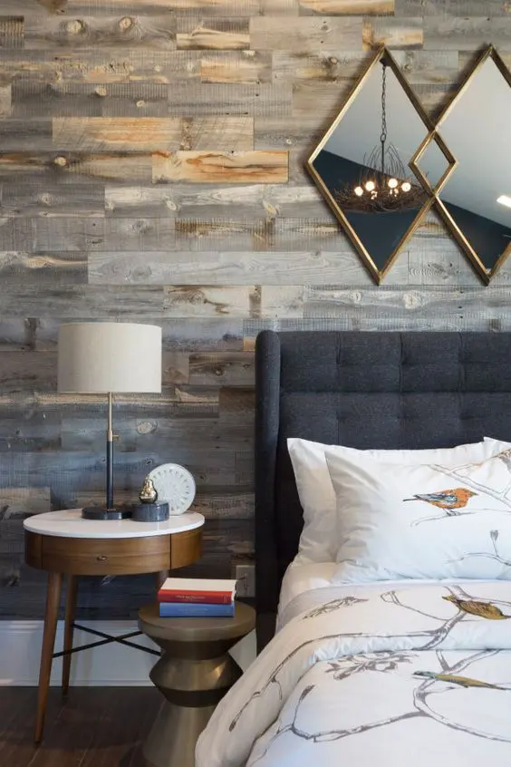 contemporary farmhouse bedroom with rustic wood-clad accent wall
