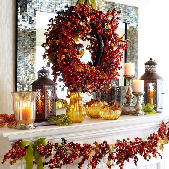 glass pumpkins, berry wreath, leaf garland, candles