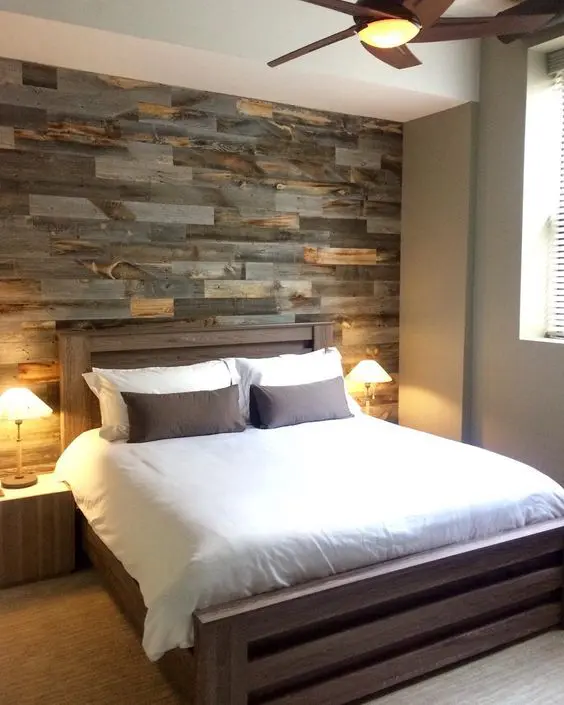 faux pallet wall is made from thin pieces of actual wood