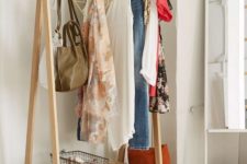 08 wooden clothing rack with a shelf for storage