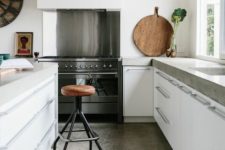 09 sleek concrete with a natural look makes the kitchen more stylish
