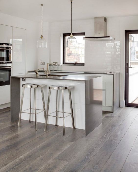 grey hardwood floors look awesome with stainless steel kitchen items
