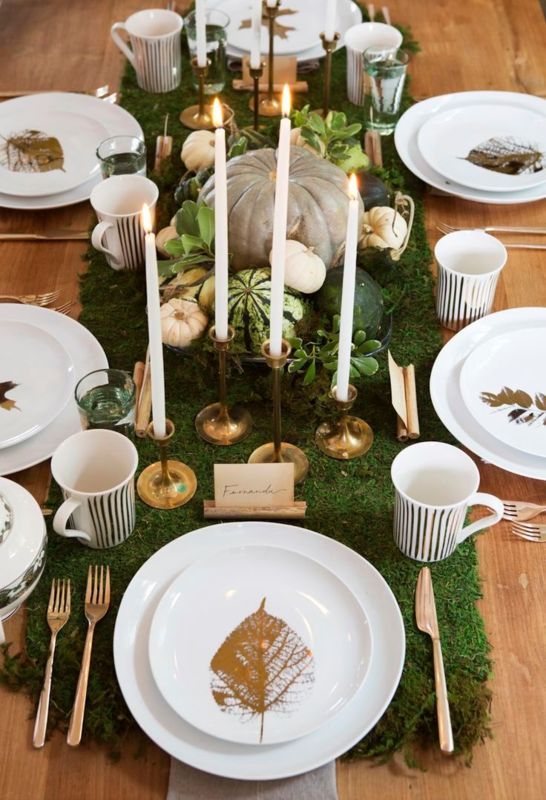 moss table runner, pumpkins, gilded candle holders and leaves