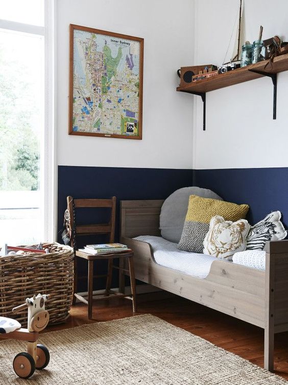 11 comfy wooden bed and open shelving with favorite toys above it