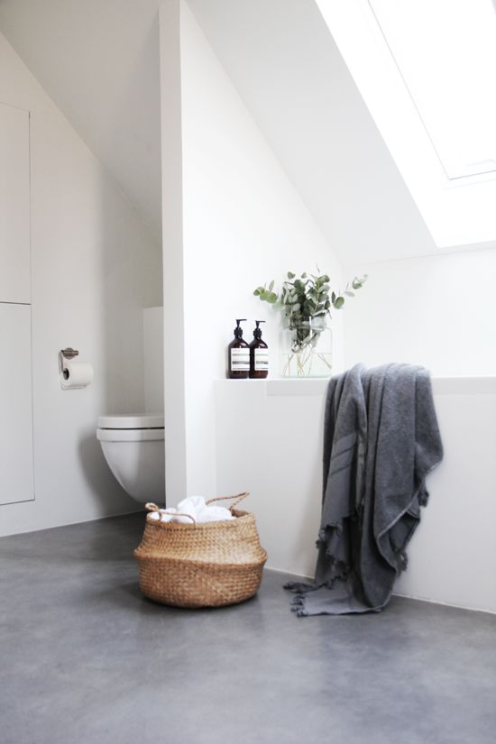 Concrete floors are ideal for a bathroom as they are water resistant and thermal shock resistant