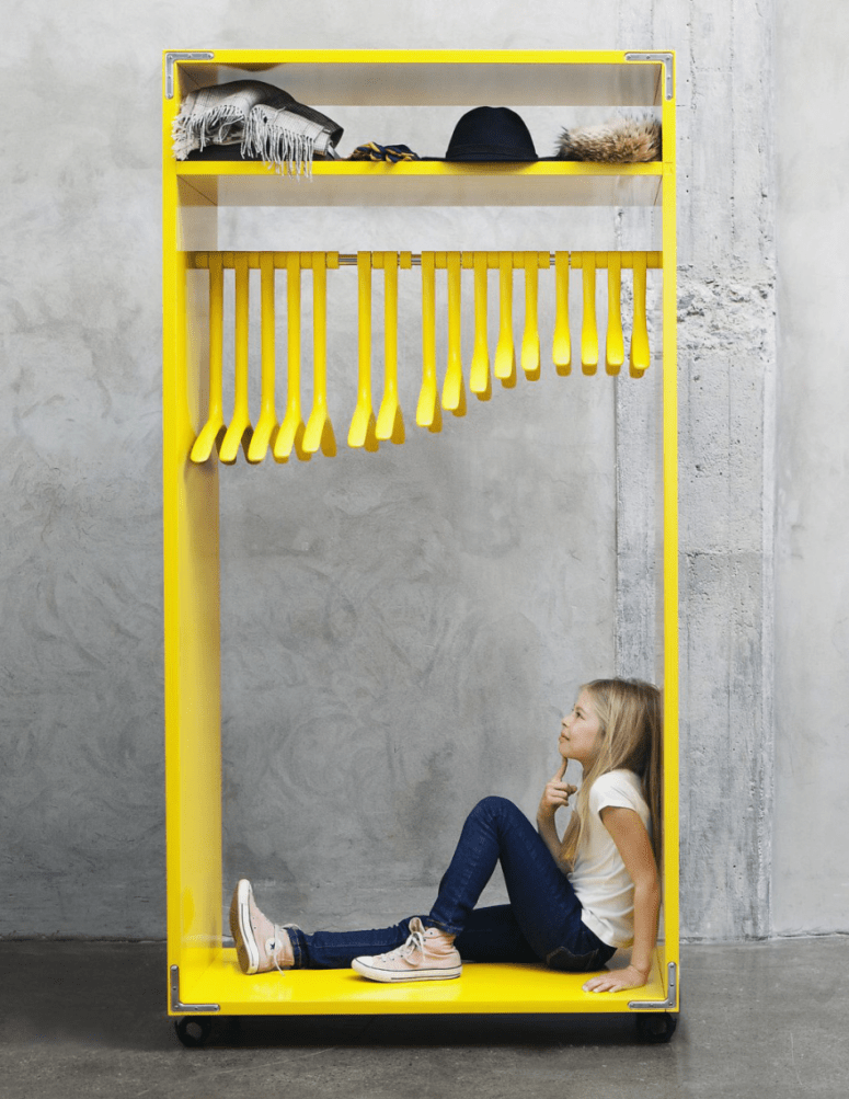 bold yellow designer's rack made of MDF with 3D printed hangers