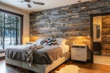12 reclaimed wood wall paneling makes the room comfier