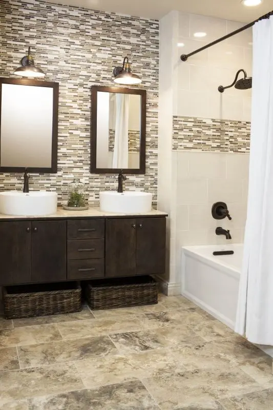 travertine floors become an accent in this bathroom
