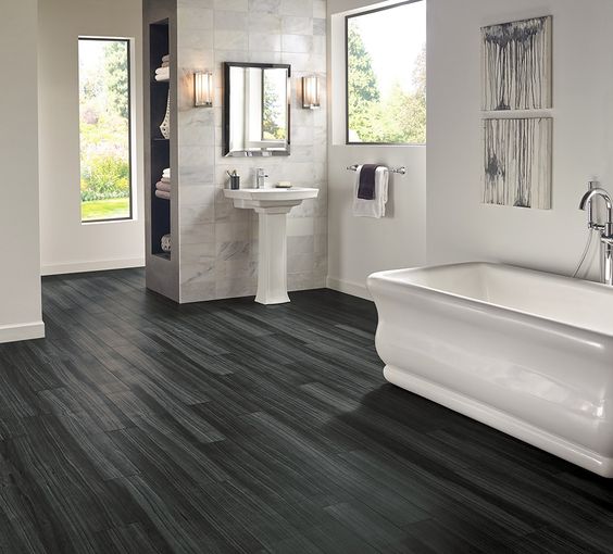 dark grey and black vinyl plank flooring, which is water resistant