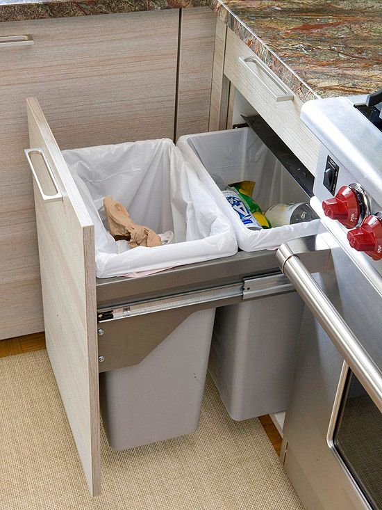 pull-out double trash cans in the kitchen island