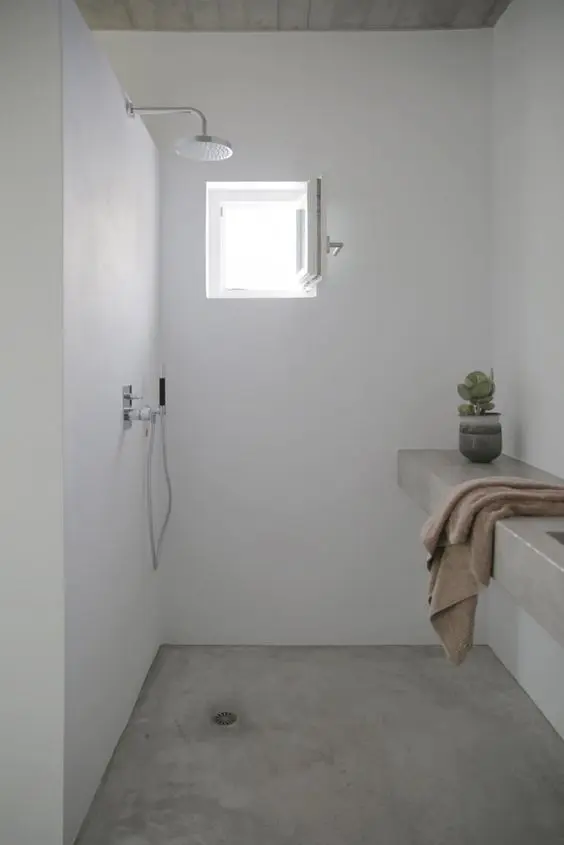 There's no better cover for a shower than concrete, it's mildew resistant and thermal shock resistant
