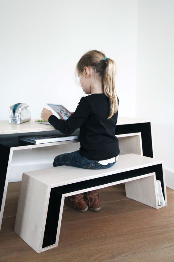 16 a desk and a bench with storage compartments that save a lot of space