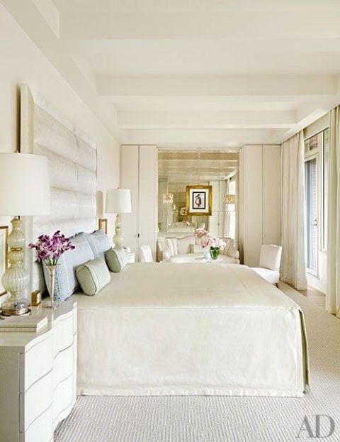 Cream colored floors continue the decor theme and add coziness to the space