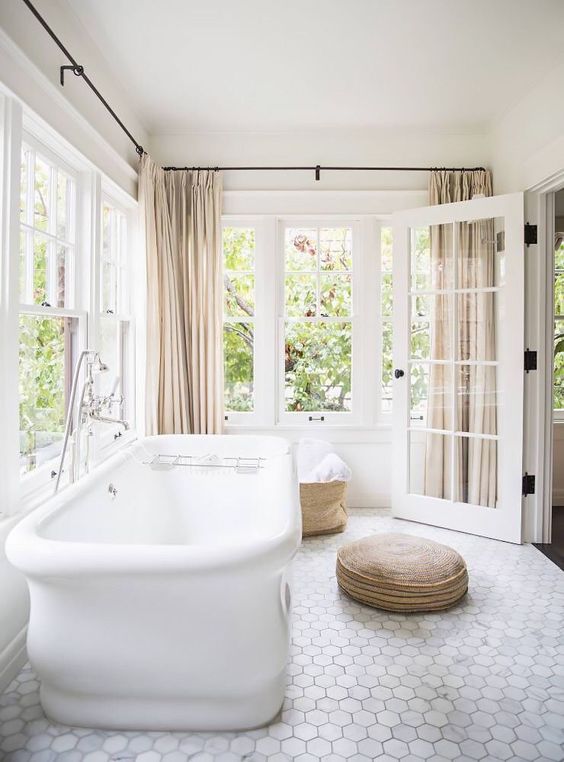 marble hex tile floors make this bathroom more refined