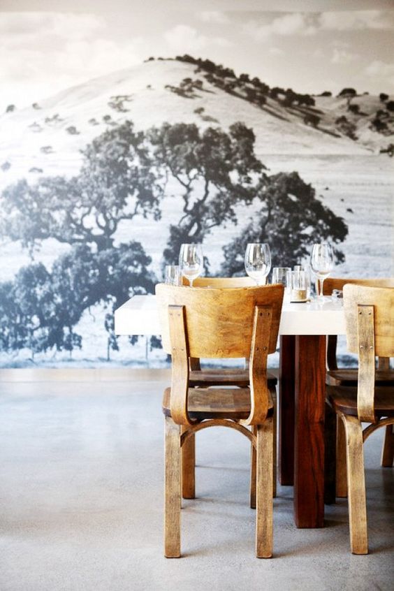 black and white landscape mural to enliven a simple dining area