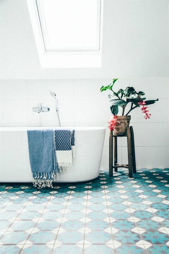 blue tiles to keep the room looking lively without having to over-decorate
