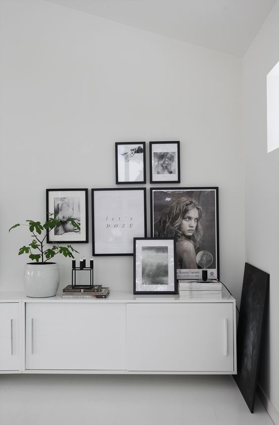 Nordic interior with white wall-mounted cabinets