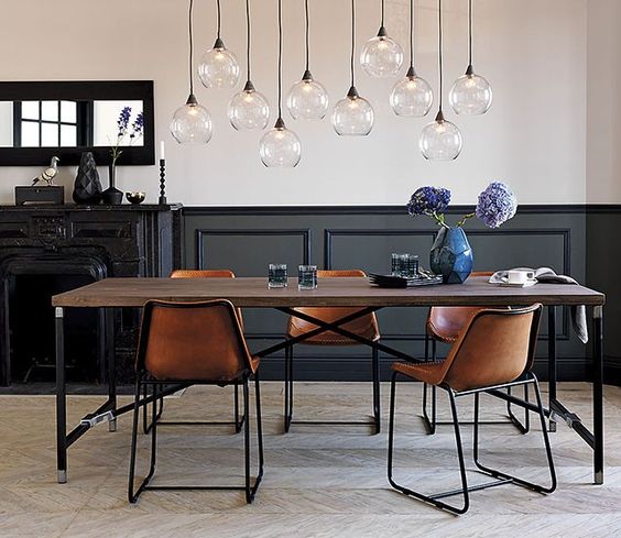 black wainscoting in an industrial dining space