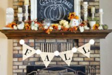 19 bold faux fall flowers, pumpkins, candles in vintage candle holders