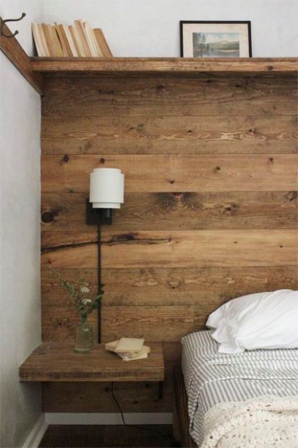 warm-stained accent wall with wall-mounted nightstands