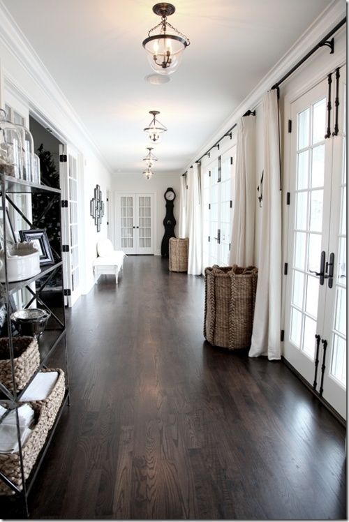 dark hardwood floors for an entryway to make it look luxurious