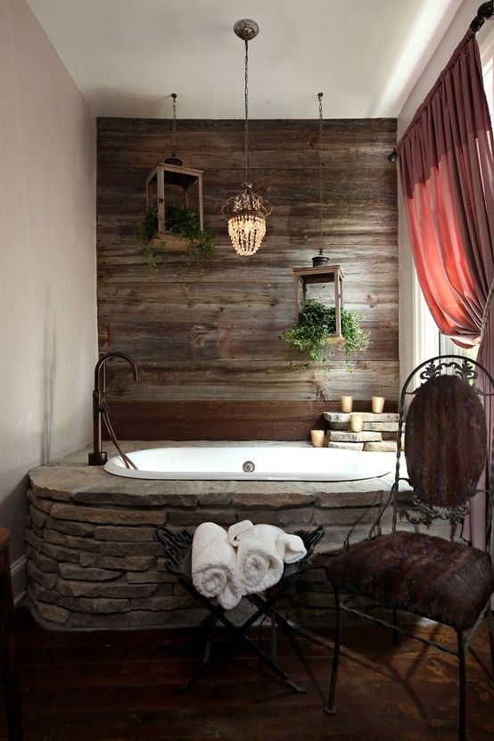dark wood wall echoes with stone bathtub decor