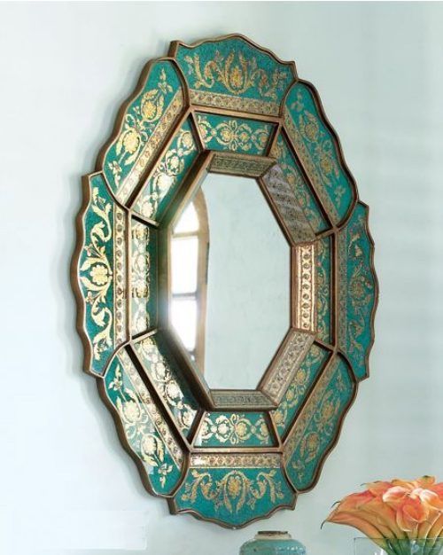 green and gold carved mirror frame