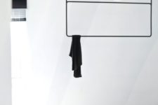 22 black hanging metal clothes rack