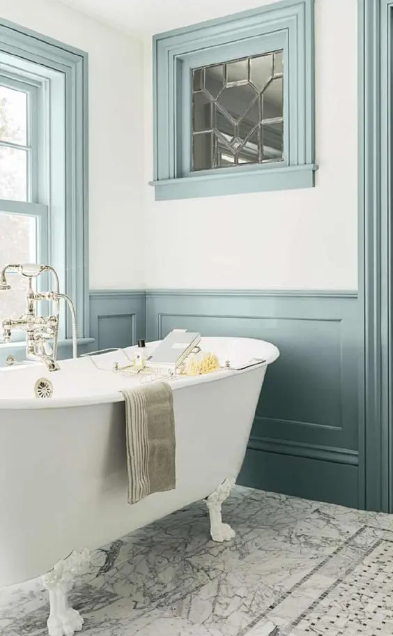 turquoise wainscoting echoes with frames (Carpenter &amp; MacNeille)