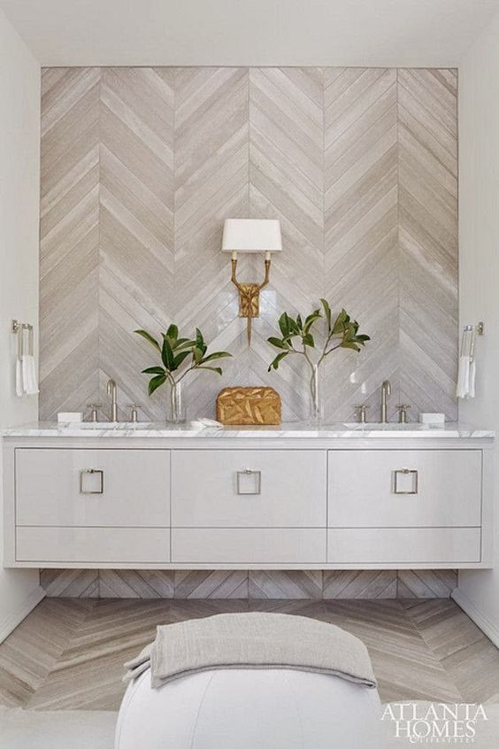 wood is a hot decor trend for bathrooms, here it's a whitewashed diagonal wall