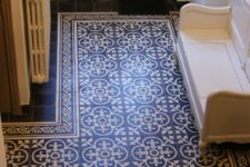 23 Portuguese tiles create an area rug look at the entryway