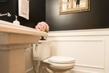 23 traditional powder room with a high ceiling, black walls and white wainscoting