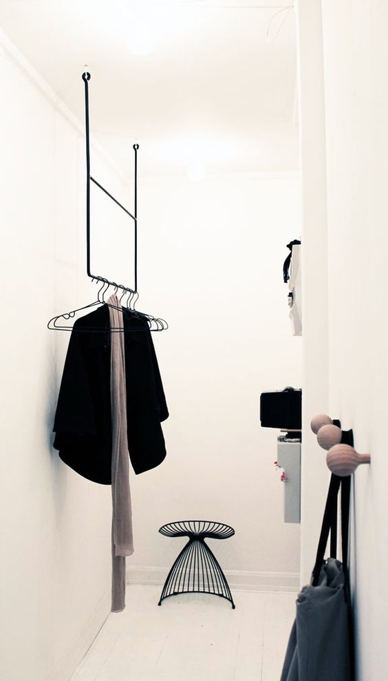 minimal steel rack hanging from the ceiling