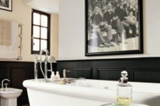 28 art deco masculine bathroom with black wainscot