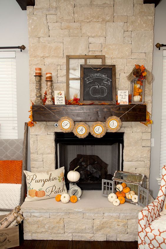 small gourds, a chalkboard and faux fall leaves, a paper bunting