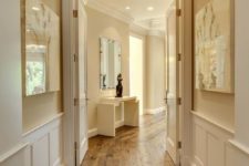 29 weathered wood floors with molding and cream color walls