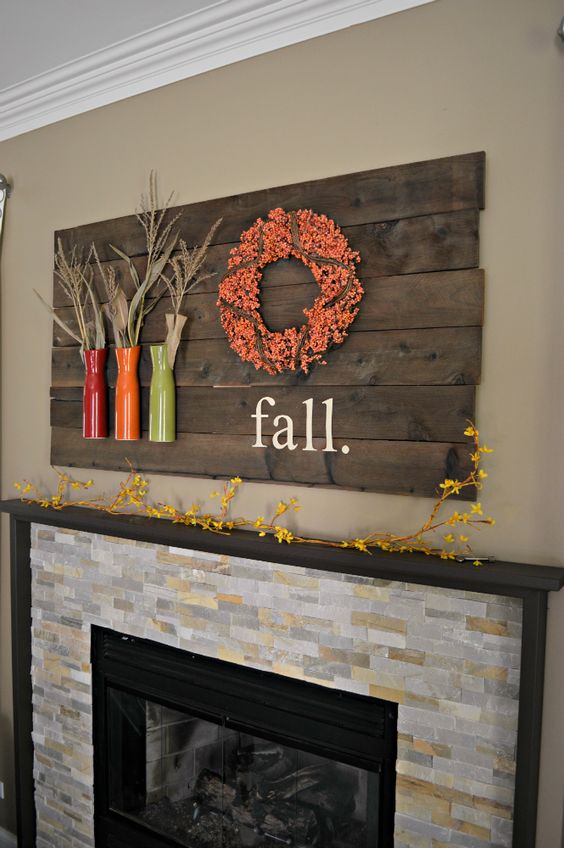 pallet board with vases and a wreath with words