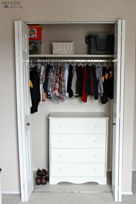 In wall closet with holders and a sideboard for smaller things