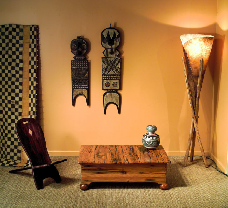 Furniture made of jarrah wood could definitely become an African-inspired touch to any room's decor. African "plank masks" are also perfect for a themed room. (Phases Africa)