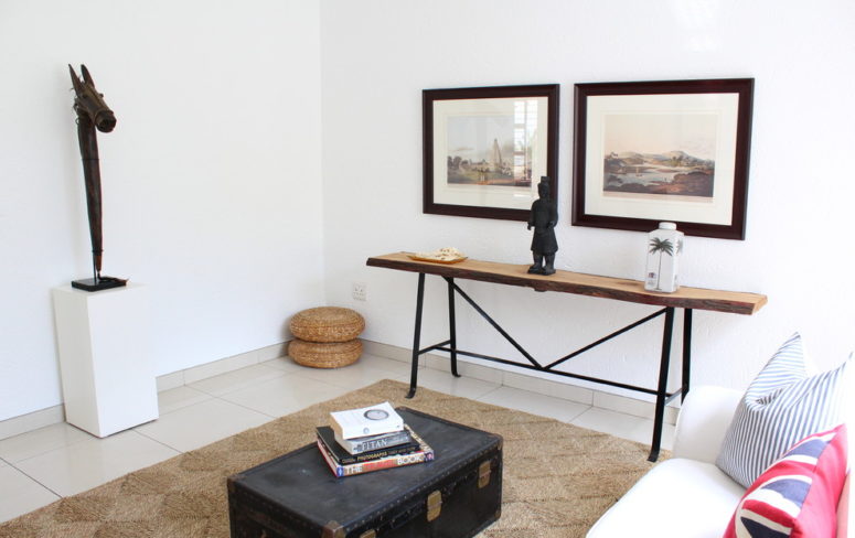 Using a chest as a coffee table work as a charm for a ethnic-themed room. (Illuminate Home Staging)