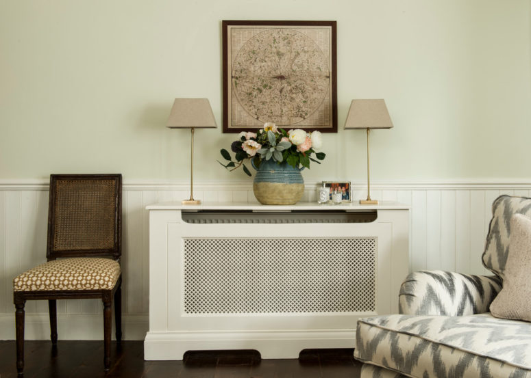 a practical solution to cover an ugly radiator that is designed like a console table (Lisette Voute Designs)