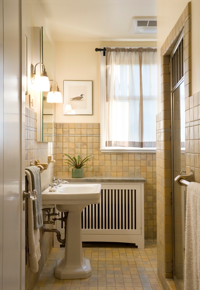 a radiator cover is a must for a bathroom because you can't hide radiators there any other way (Hughes Studio Architects)