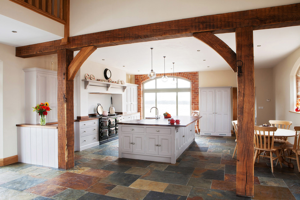 Barn-inspired interiors looks great with natural stone-inspired tiles. (Hill Farm Furniture Ltd)