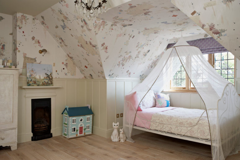 Beige wainscoting in this kids room could act as an easy to clean wallpaper protection. (Godrich Interiors)