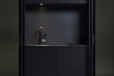 01 Affilato Hide unit has a sink and cooking area with lights, it can be closed like a wardrobe to keep the kitchen uncluttered