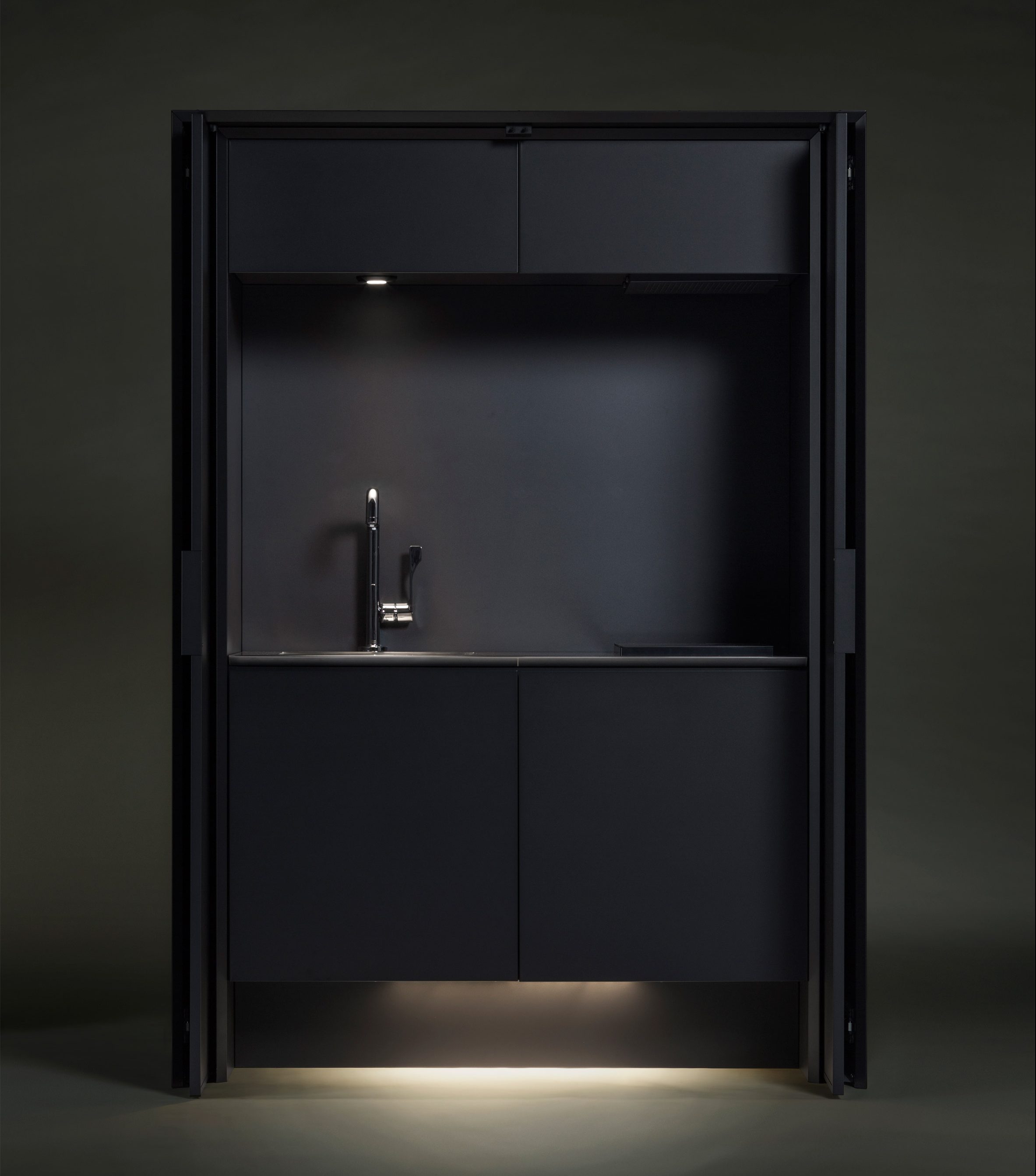 Affilato Hide unit has a sink and cooking area with lights, it can be closed like a wardrobe to keep the kitchen uncluttered