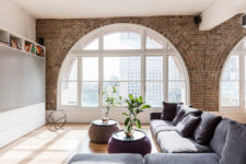 01 Converted warehouse apartment saves its original brickwork and beautiful arched windows