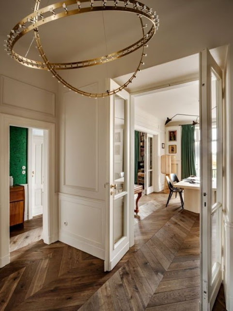 This apartment is located in Warsaw but is decorated in 1930s Paris style with a touch of irony
